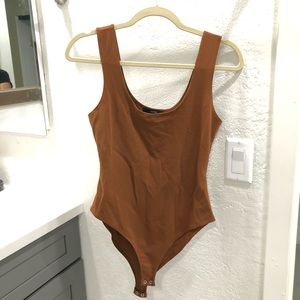 Brown bodysuit